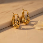Golden Oval Hoop Earrings | THE HUBBELL COLLECTIVE